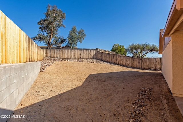 view of yard featuring a fenced backyard