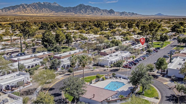 drone / aerial view featuring a mountain view