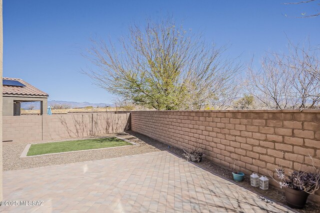 view of patio featuring a fenced backyard