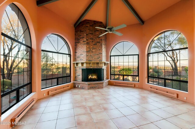 5460 N Paseo Pescado, Tucson, AZ 85718 - unfurnished sunroom featuring a baseboard heating unit and healthy amount of natural light