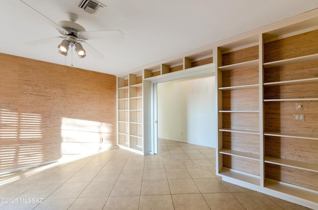 5460 N Paseo Pescado, Tucson, AZ 85718 - tiled spare room with visible vents and a ceiling fan