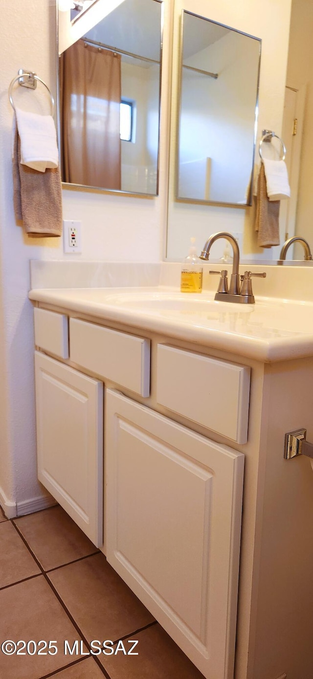 bathroom featuring vanity and tile patterned flooring