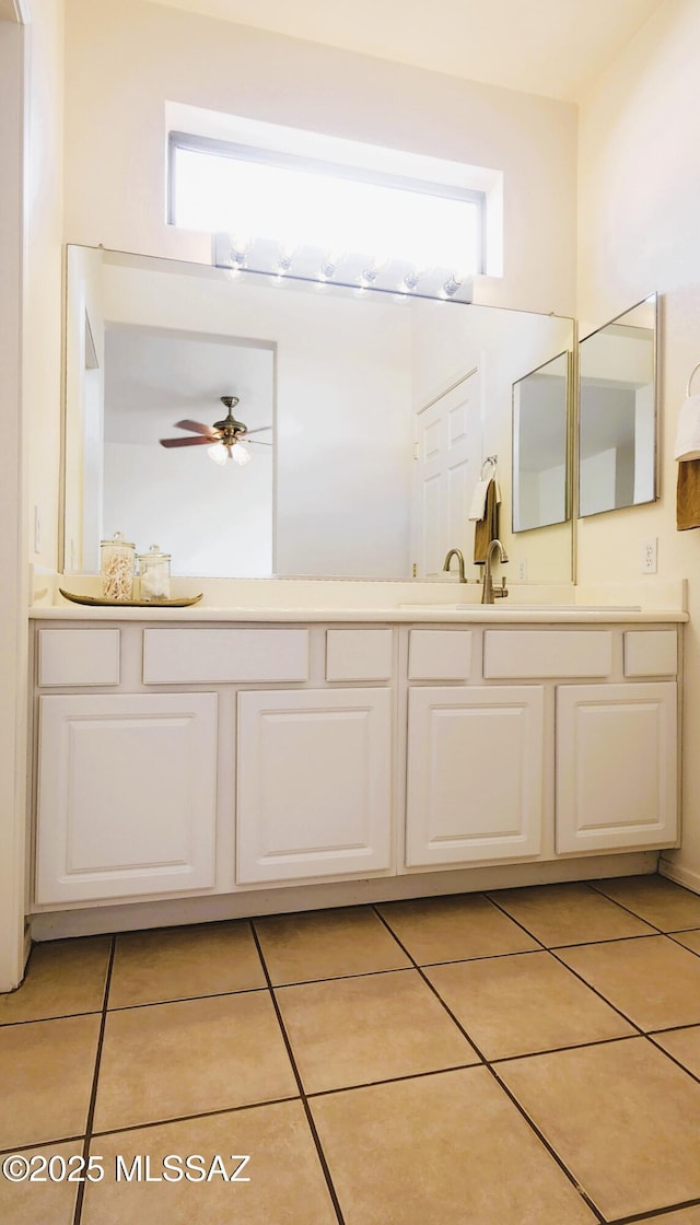 bathroom featuring plenty of natural light, tile patterned flooring, vanity, and ceiling fan