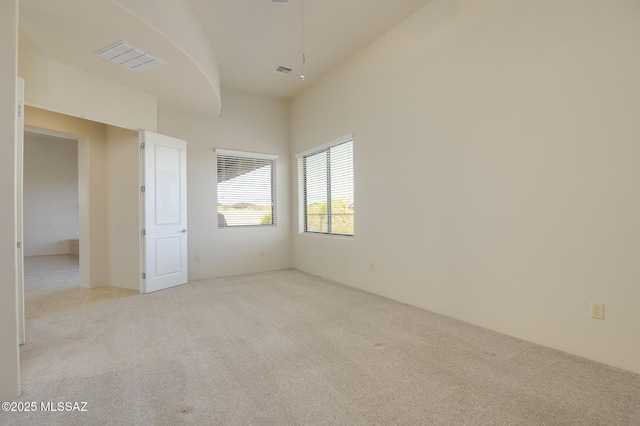 11626 N Moon Ranch Pl, Marana, AZ 85658 - unfurnished room featuring visible vents, light colored carpet, and a ceiling fan