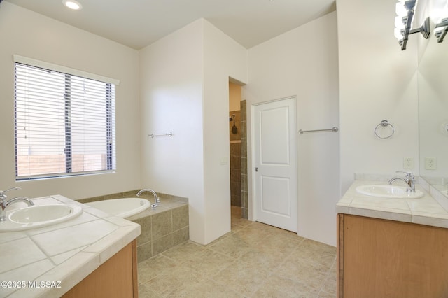 11626 N Moon Ranch Pl, Marana, AZ 85658 - bathroom with tile patterned flooring, two vanities, a tile shower, and a sink