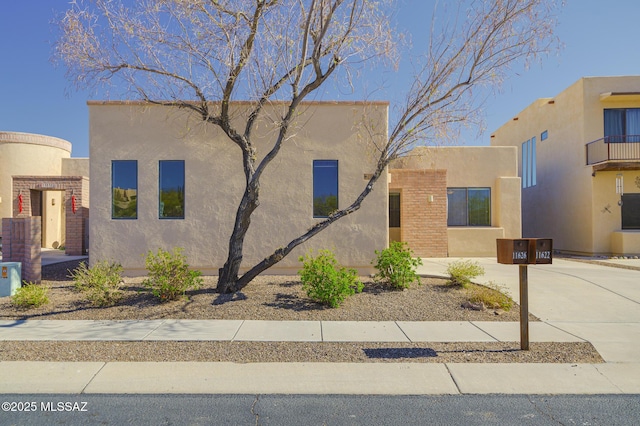 11626 N Moon Ranch Pl, Marana, AZ 85658 - pueblo-style home featuring stucco siding
