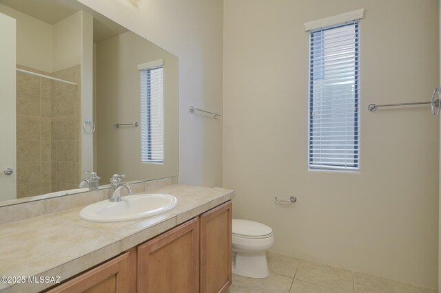 11626 N Moon Ranch Pl, Marana, AZ 85658 - bathroom featuring toilet, walk in shower, vanity, and tile patterned flooring