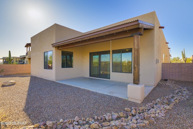 11626 N Moon Ranch Pl, Marana, AZ 85658 - back of house with a patio area, stucco siding, and fence