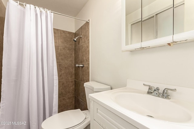 7267 E Eastview Dr, Tucson, AZ 85710 - full bathroom with toilet, vanity, and a tile shower