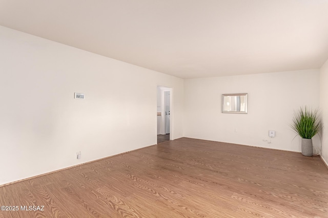 7267 E Eastview Dr, Tucson, AZ 85710 - spare room with wood finished floors