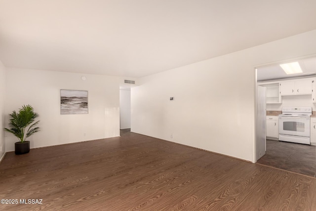 7267 E Eastview Dr, Tucson, AZ 85710 - unfurnished living room featuring dark wood finished floors