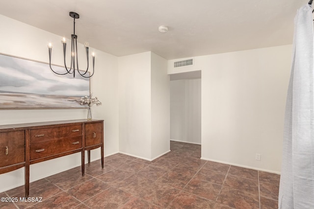 7267 E Eastview Dr, Tucson, AZ 85710 - dining area with a chandelier and baseboards