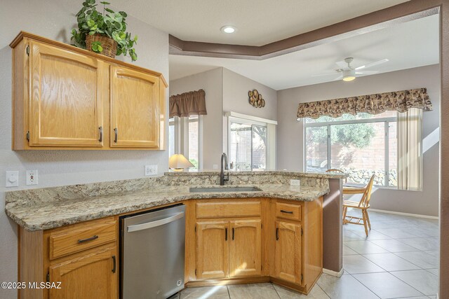 1117 E Regent Dr, Oro Valley, AZ 85755 - kitchen with a healthy amount of sunlight, dishwasher, a peninsula, and a sink