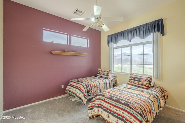 1117 E Regent Dr, Oro Valley, AZ 85755 - bedroom featuring carpet flooring, baseboards, visible vents, and ceiling fan