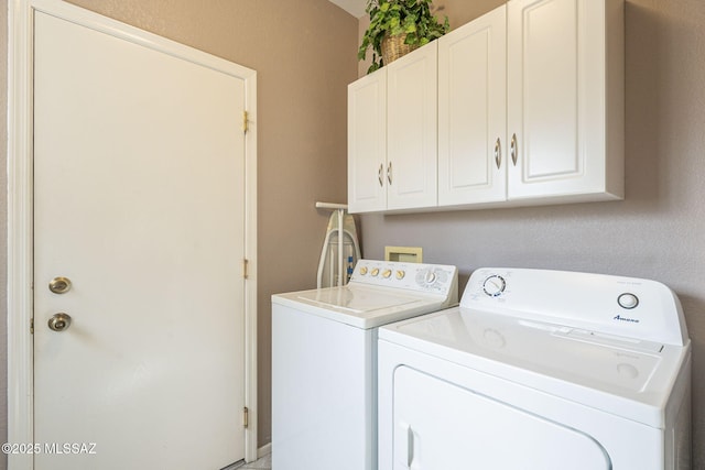 1117 E Regent Dr, Oro Valley, AZ 85755 - washroom featuring cabinet space and washing machine and dryer