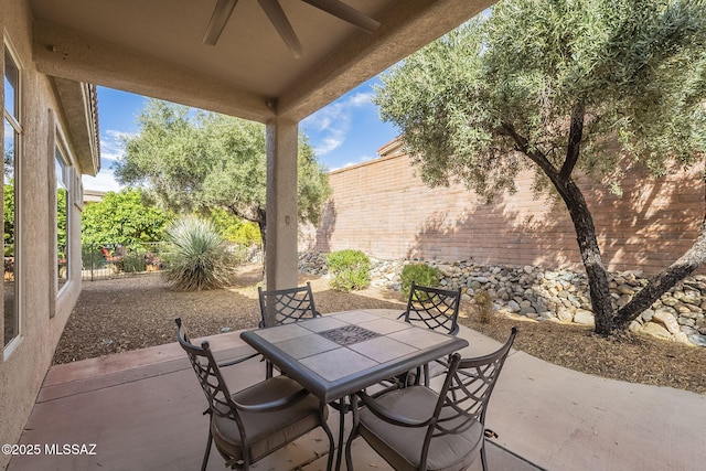 1117 E Regent Dr, Oro Valley, AZ 85755 - view of patio with a fenced backyard, outdoor dining space, and a ceiling fan