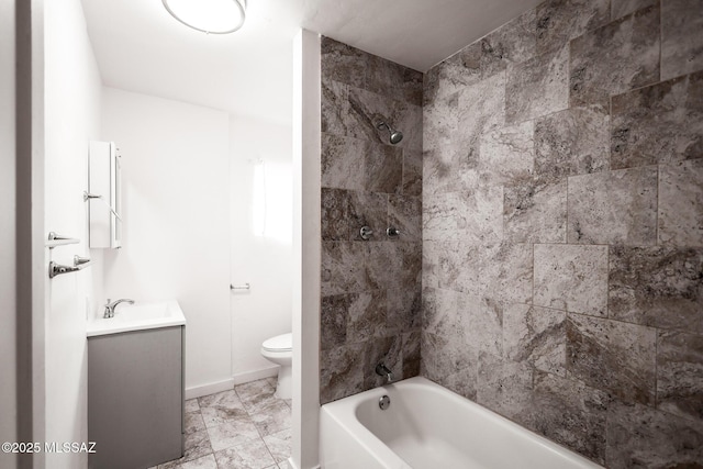 bathroom featuring tub / shower combination, baseboards, toilet, and vanity