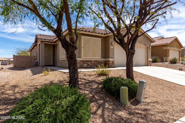 7483 S Salt Water Dr, Tucson, AZ 85757 - view of front facade with stucco siding, driveway, a tile roof, fence, and a garage