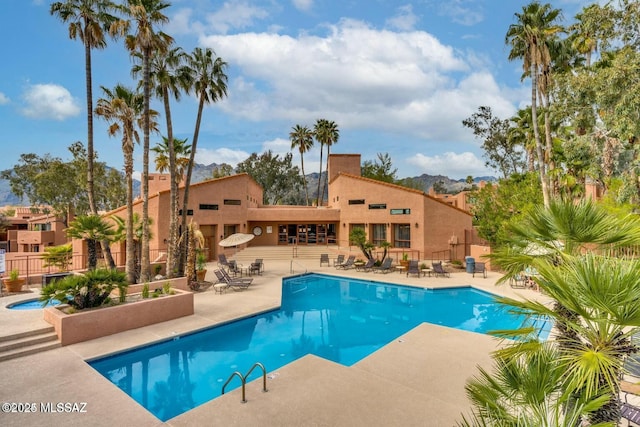 5051 N Sabino Canyon Rd Unit 1152, Tucson, AZ 85750 - community pool featuring a patio area and fence