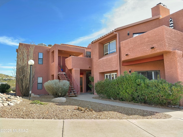 5051 N Sabino Canyon Rd Unit 1152, Tucson, AZ 85750 - view of building exterior featuring stairway