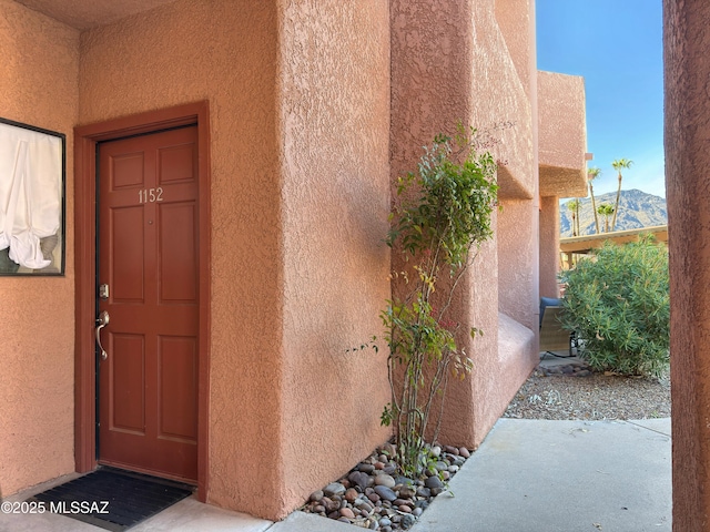 5051 N Sabino Canyon Rd Unit 1152, Tucson, AZ 85750 - property entrance with stucco siding and a mountain view