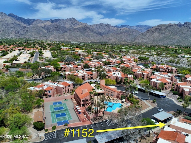 5051 N Sabino Canyon Rd Unit 1152, Tucson, AZ 85750 - aerial view of residential area featuring a mountain backdrop and a pool area