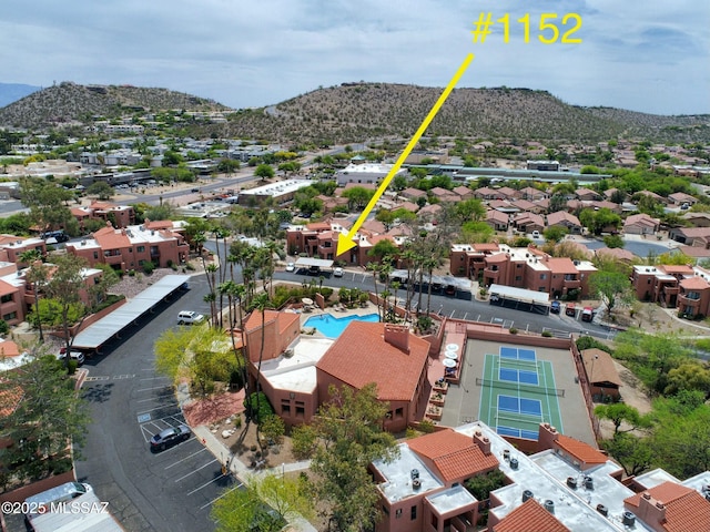 5051 N Sabino Canyon Rd Unit 1152, Tucson, AZ 85750 - aerial perspective of suburban area with a mountain backdrop and a pool area