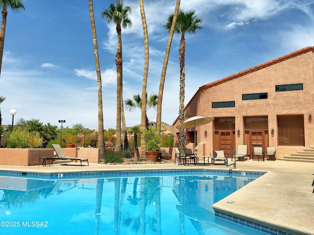 5051 N Sabino Canyon Rd Unit 1152, Tucson, AZ 85750 - community pool featuring a patio area and fence