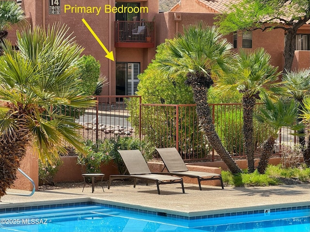 5051 N Sabino Canyon Rd Unit 1152, Tucson, AZ 85750 - community pool featuring fence and a patio area