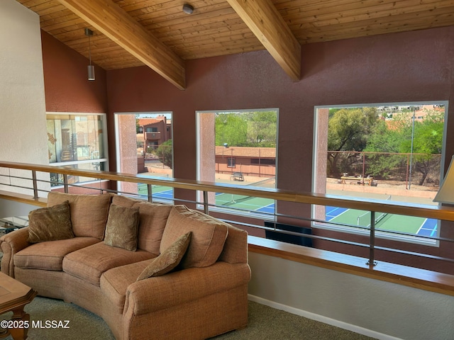 5051 N Sabino Canyon Rd Unit 1152, Tucson, AZ 85750 - carpeted living room with wood ceiling, beam ceiling, and a textured wall