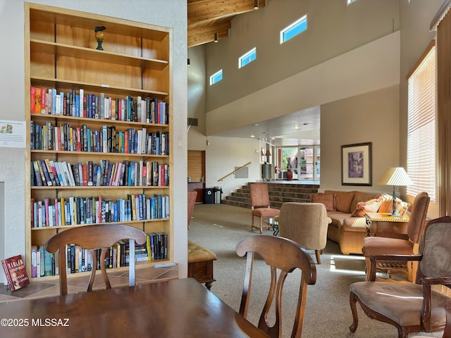 5051 N Sabino Canyon Rd Unit 1152, Tucson, AZ 85750 - living area featuring a towering ceiling, beam ceiling, carpet floors, stairs, and wooden ceiling