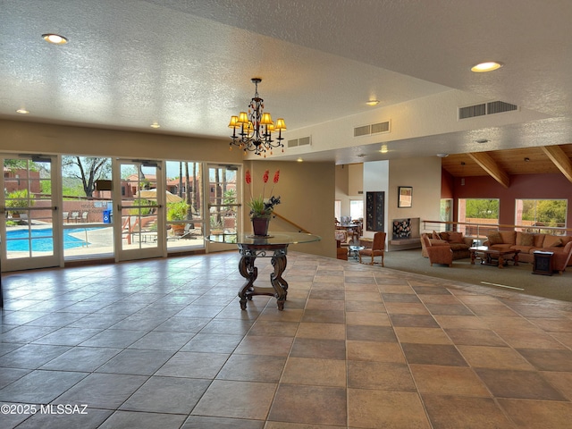 5051 N Sabino Canyon Rd Unit 1152, Tucson, AZ 85750 - common area with beamed ceiling, recessed lighting, and a textured ceiling
