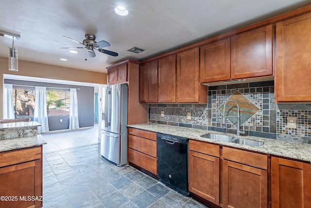 kitchen featuring stainless steel refrigerator with ice dispenser, a sink, brown cabinetry, dishwasher, and ceiling fan