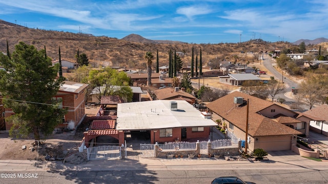 bird's eye view featuring a residential view and a mountain view