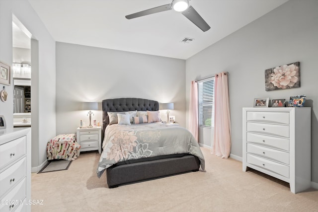 8874 W Saguaro Skies Rd, Marana, AZ 85653 - bedroom with light colored carpet, baseboards, and a ceiling fan