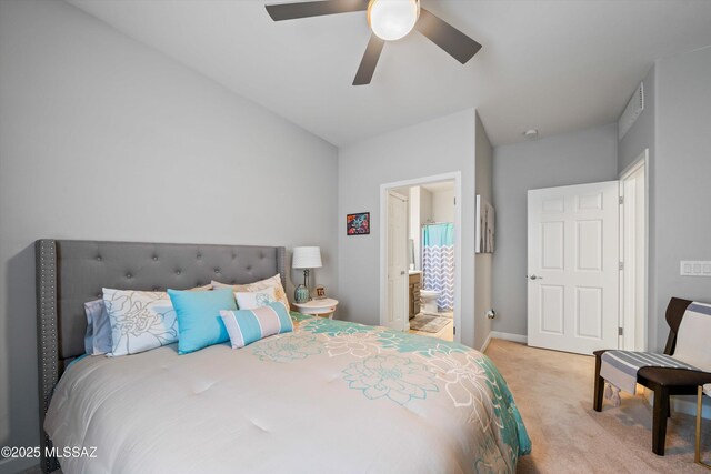 8874 W Saguaro Skies Rd, Marana, AZ 85653 - bedroom featuring carpet floors, a ceiling fan, baseboards, and ensuite bathroom