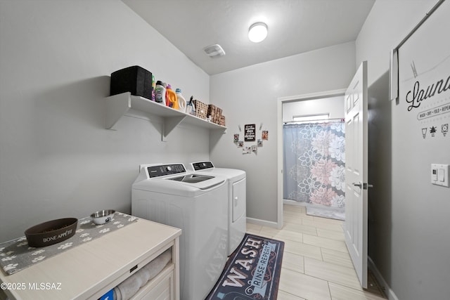 8874 W Saguaro Skies Rd, Marana, AZ 85653 - washroom featuring washing machine and dryer and baseboards