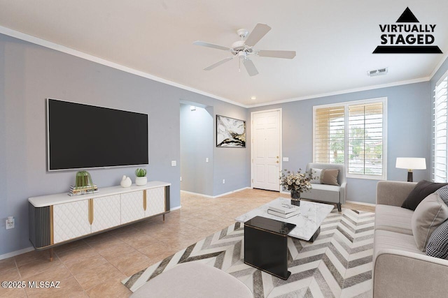 living area with baseboards, light tile patterned flooring, and crown molding
