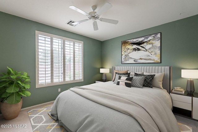 carpeted bedroom featuring visible vents, ceiling fan, and baseboards