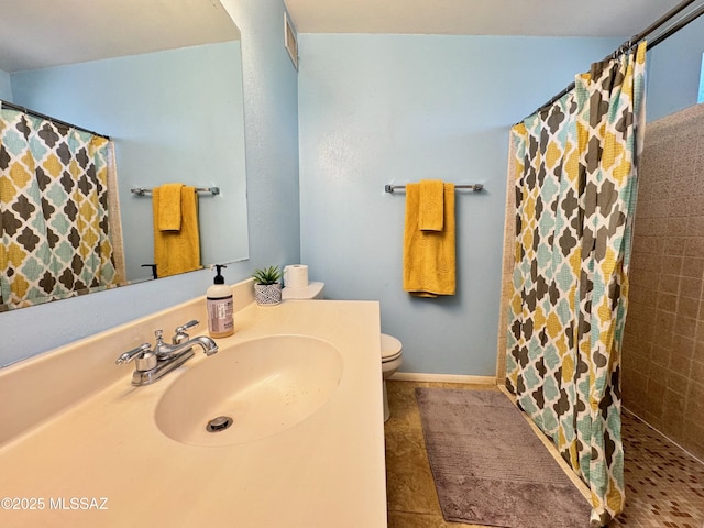 bathroom featuring vanity, toilet, curtained shower, and visible vents