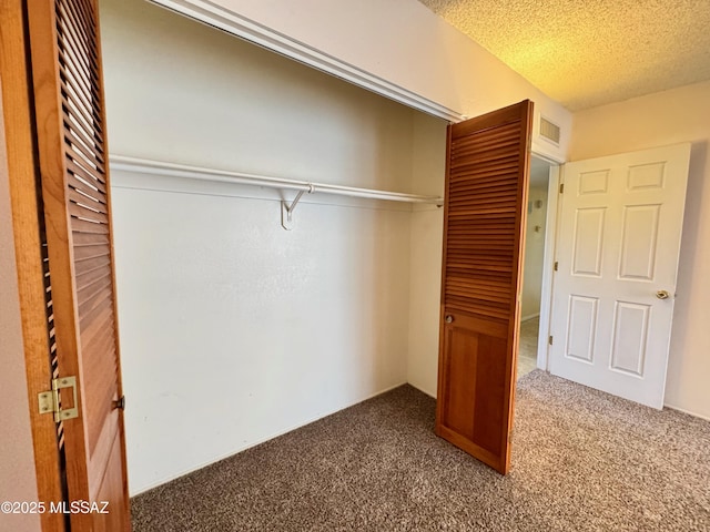 closet featuring visible vents