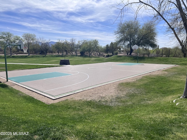 view of sport court featuring a lawn and community basketball court