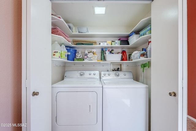 laundry area with separate washer and dryer and laundry area