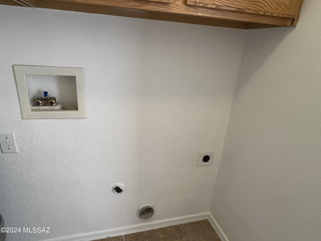 laundry room with electric dryer hookup, baseboards, hookup for a washing machine, and laundry area