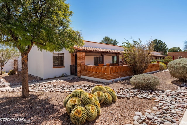 207 S Paseo Tierra Unit A, Green Valley, AZ 85614 - view of front of house with a porch and stucco siding