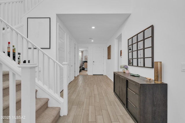 8111 S Soltero Mine Dr, Tucson, AZ 85747 - entryway with recessed lighting, stairway, and light wood finished floors