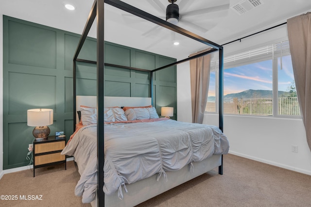 8111 S Soltero Mine Dr, Tucson, AZ 85747 - bedroom with light colored carpet, recessed lighting, and a mountain view