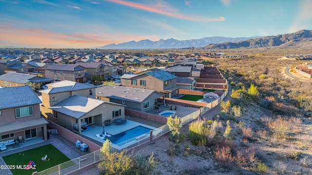 8111 S Soltero Mine Dr, Tucson, AZ 85747 - aerial perspective of suburban area featuring a mountain backdrop