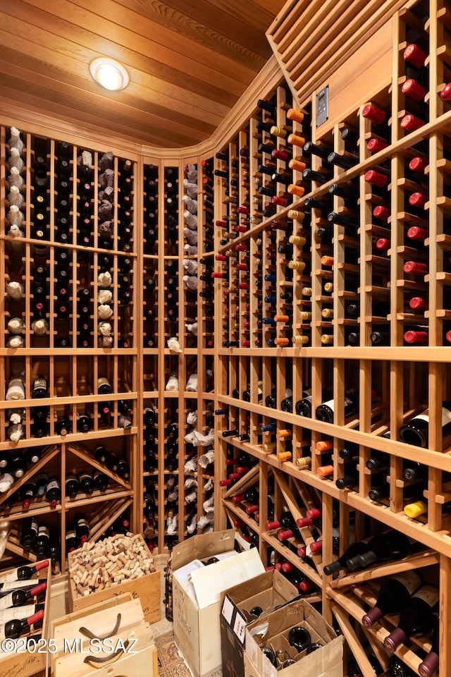 wine room featuring wood ceiling