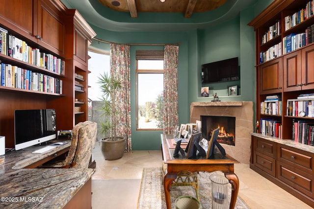 office area featuring a fireplace